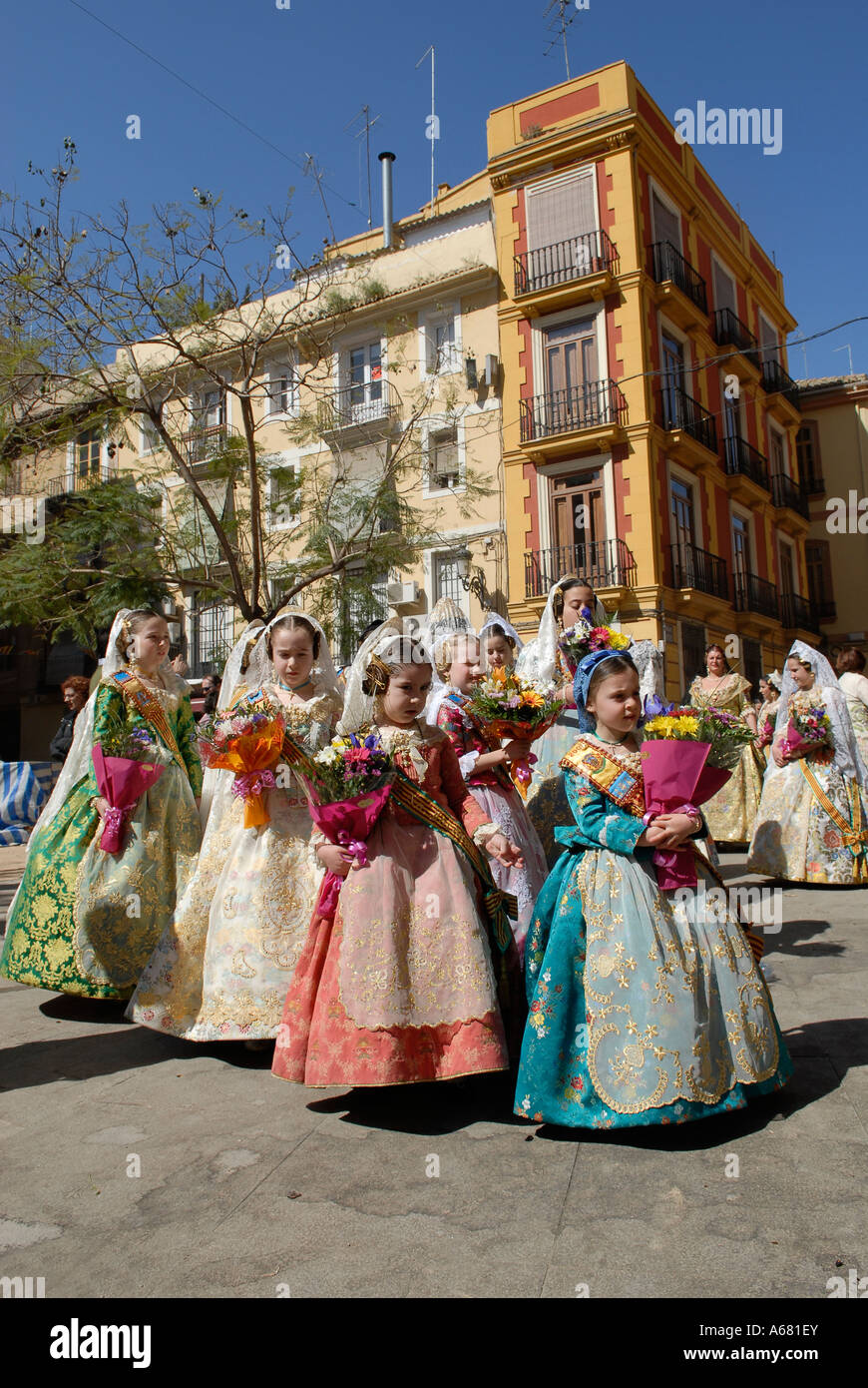 Young Falleras in traditional Valencian costume during L'Ofrena de ...