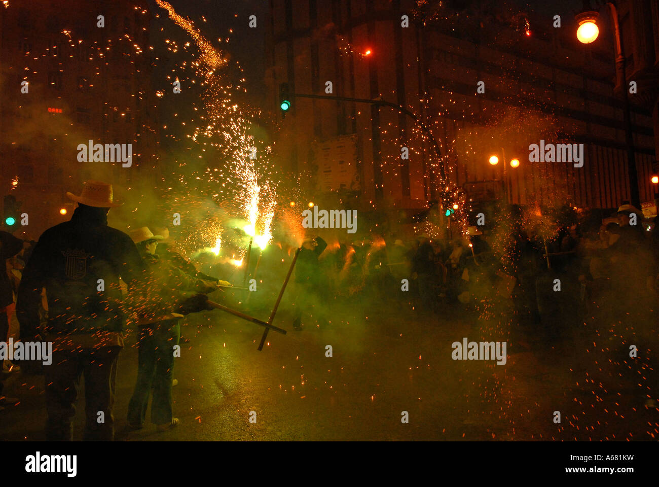 Falleros marching with sparklers during Cavalcada del Foc the Fire ...