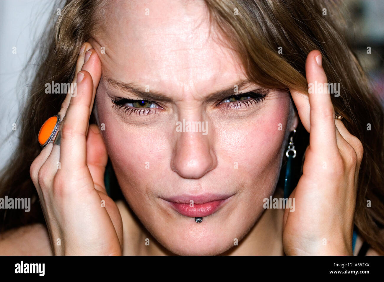 Young woman with headaches Stock Photo - Alamy