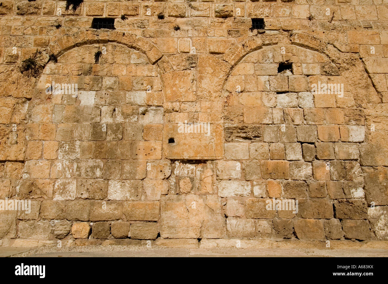 The now-blocked triple arched Huldah gate in the Southern Wall of the Temple Mount in the old city East Jerusalem Israel Stock Photo