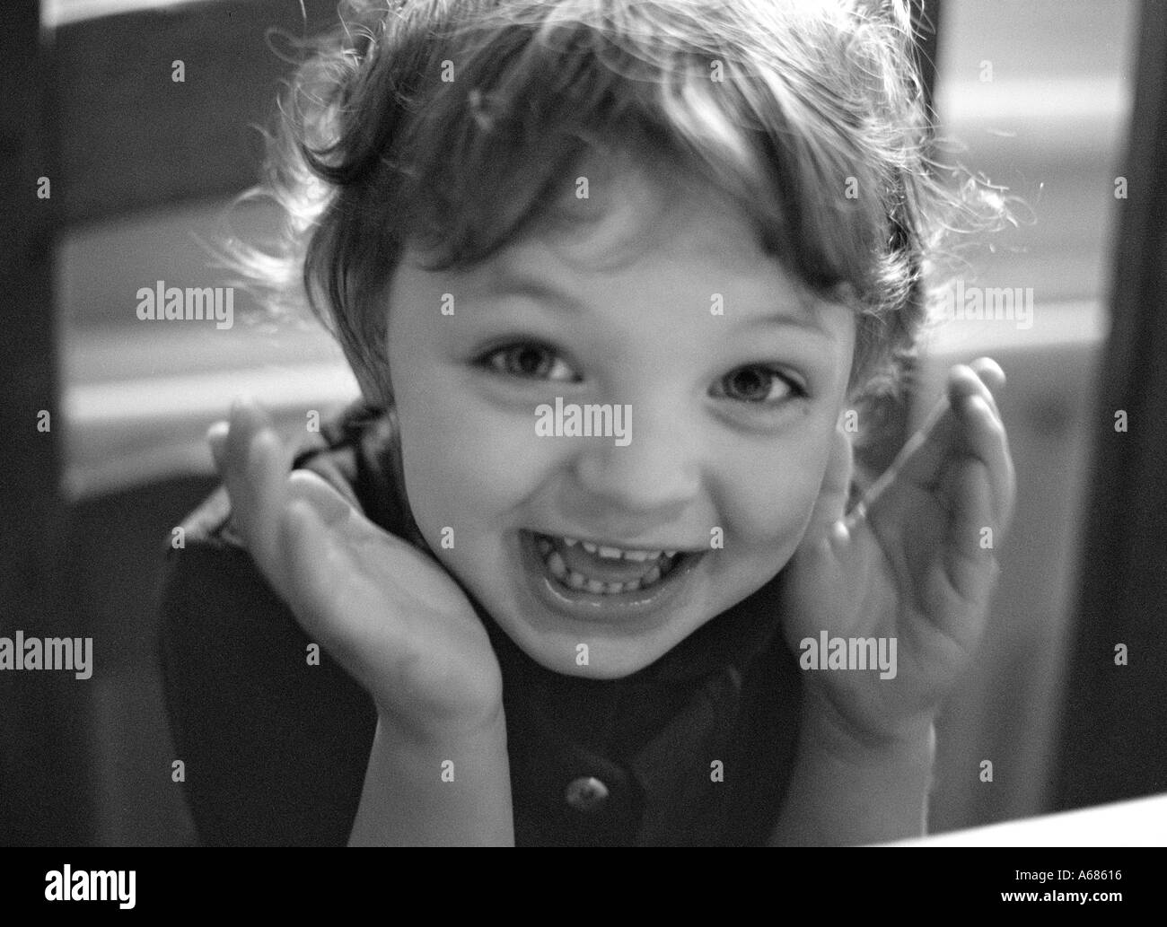 portrait of happy young boy laughing at camera Stock Photo - Alamy