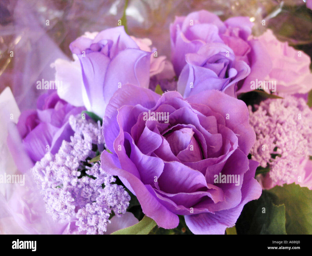 flower arrangement with purple artificial flowers Stock Photo