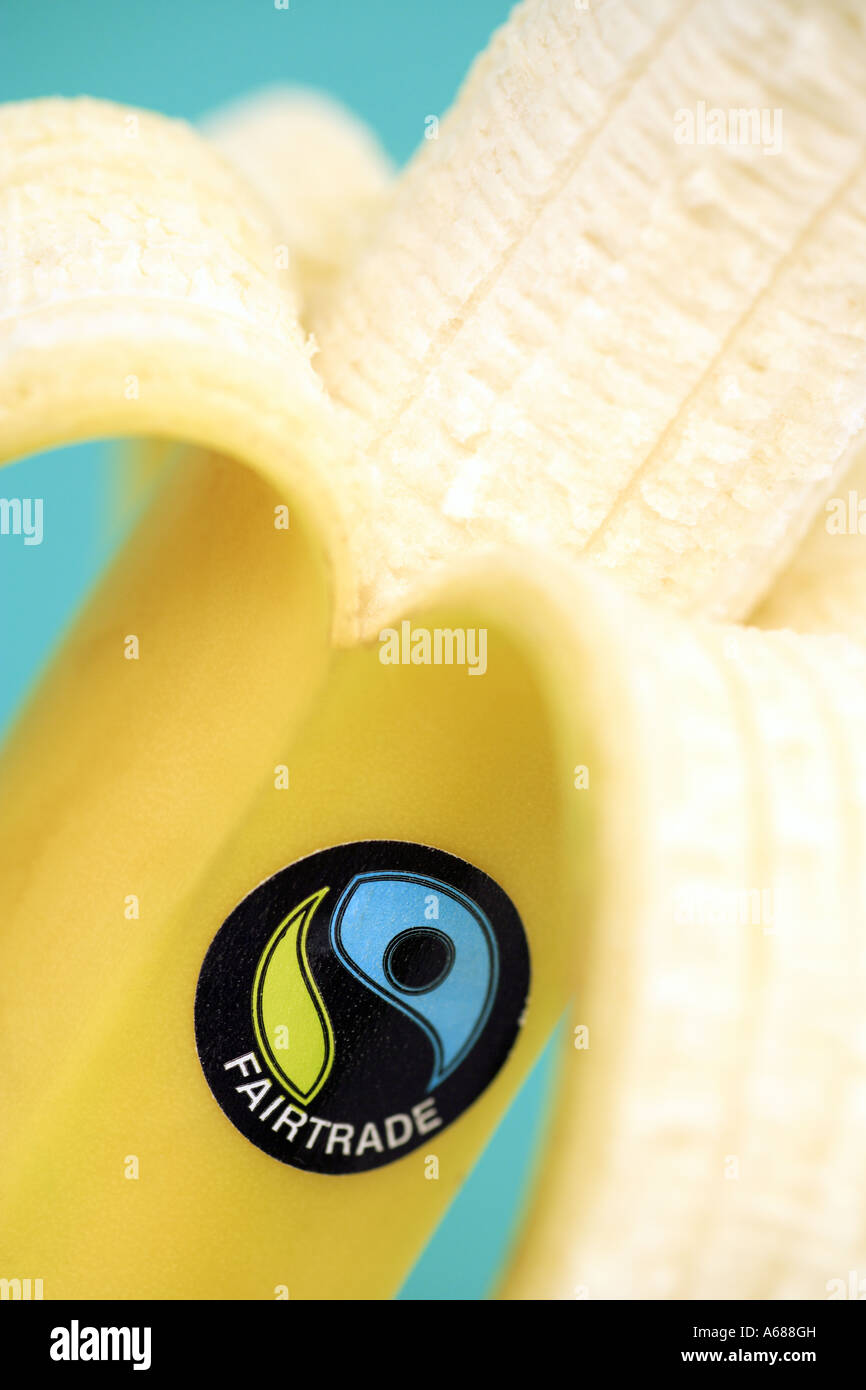 Peeling a Fair Trade banana Stock Photo
