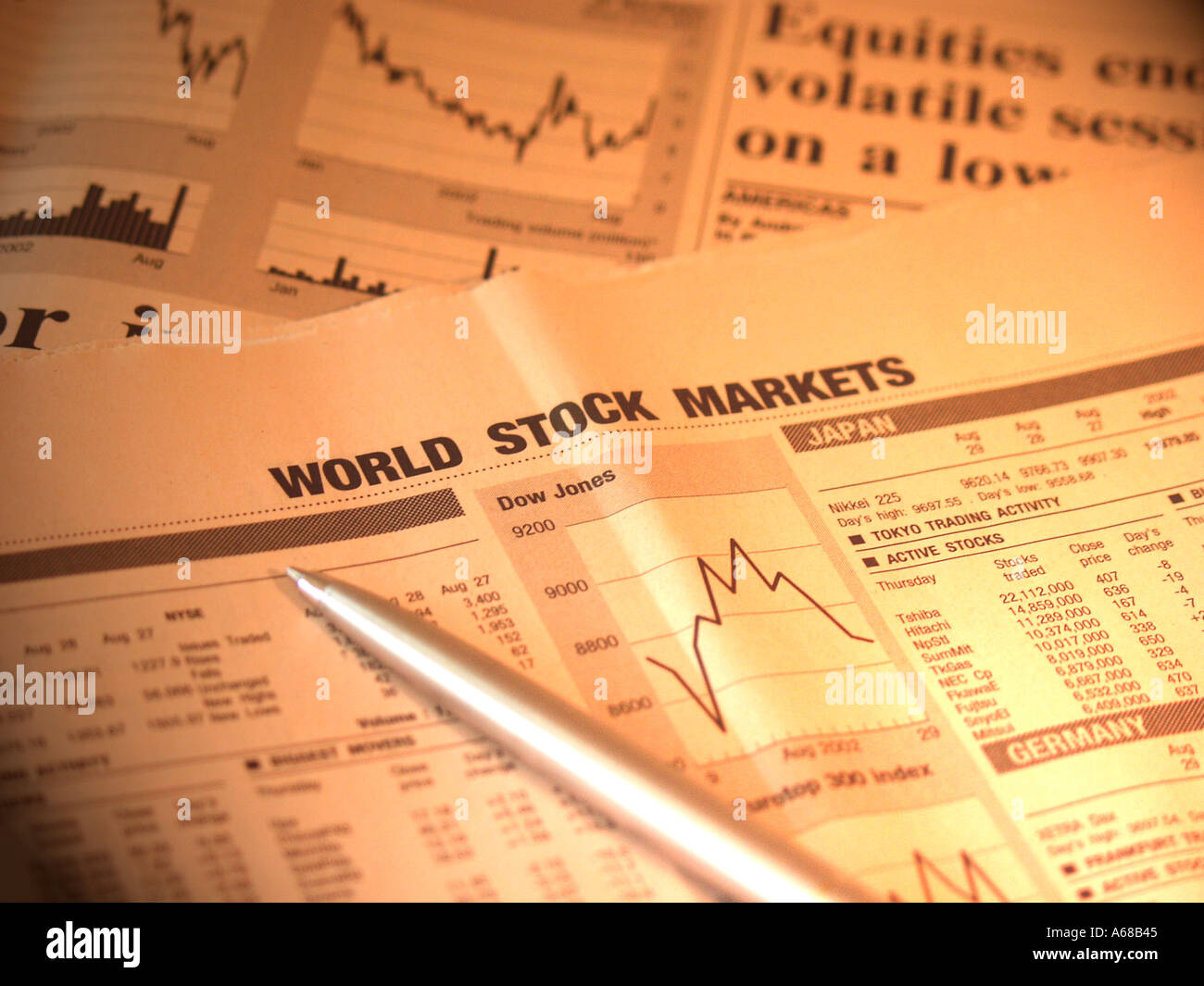 Stock market share prices in a newspaper and a pen Stock Photo
