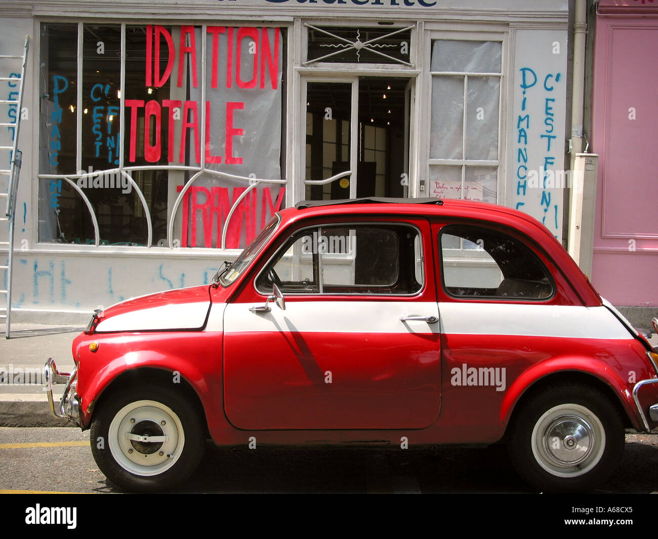 Red Fiat 500 Parked By Roadside At Quai De Valmy 10th Arr Paris Stock