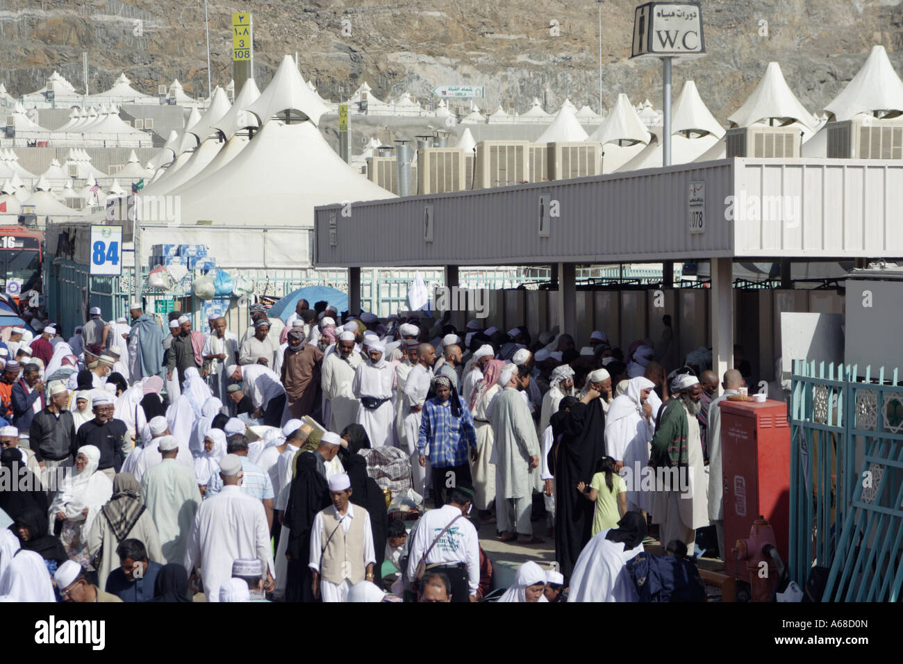 Pilgrims queuing at a public toilet in Mina, Saudi Arabia. Stock Photo