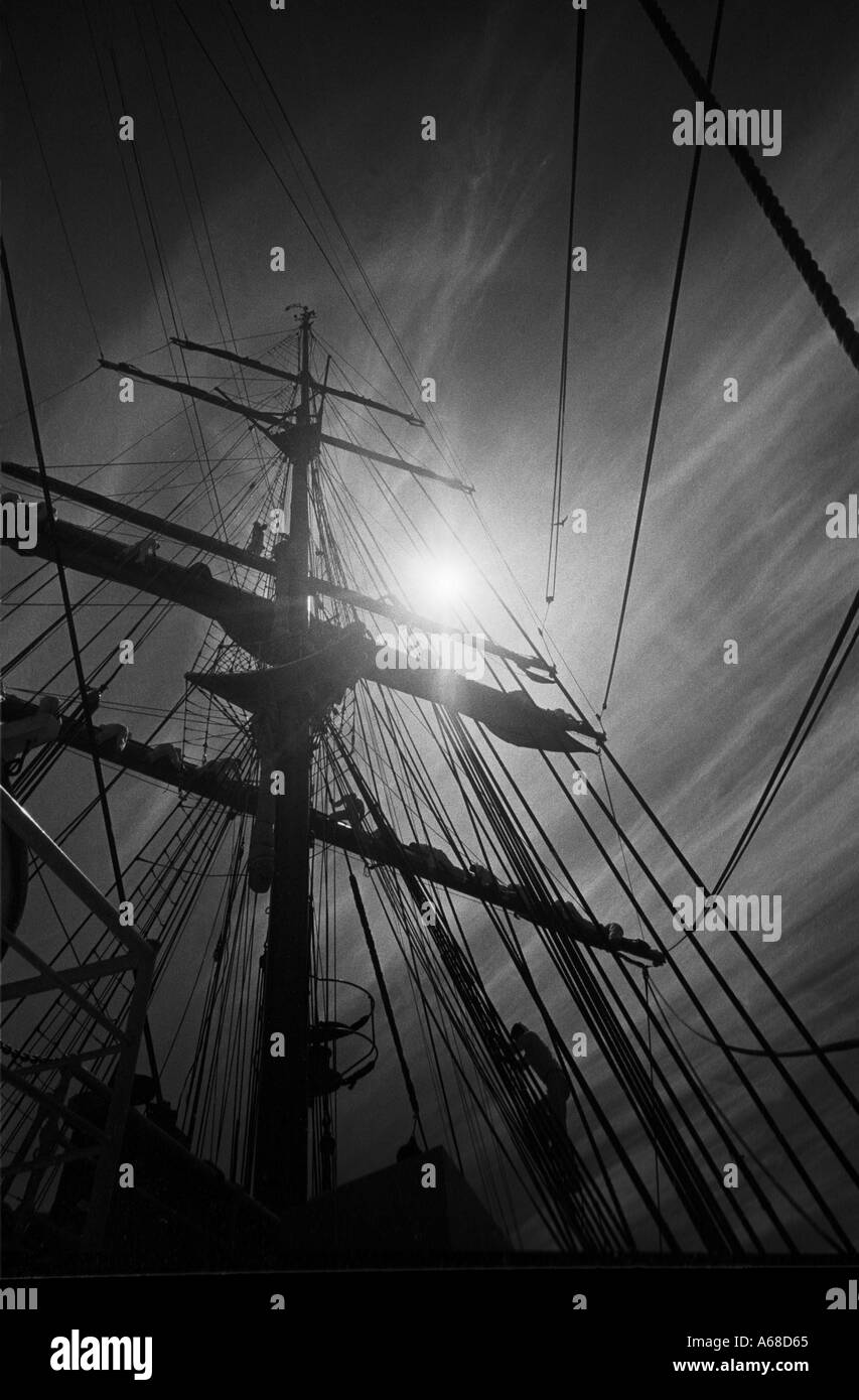 Noon day sun through the rigging of the United States Coast Guard training ship Eagle Stock Photo