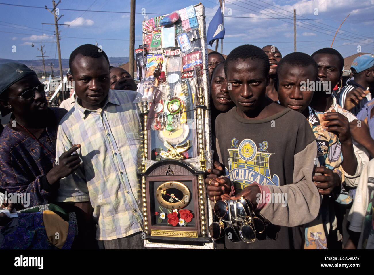 Street hawkers with portable trays, Mbeya, Tanzania Stock Photo