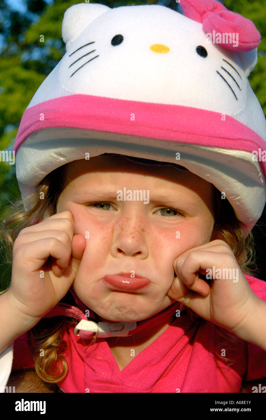 Five year old girl with bike safety helmet Stock Photo