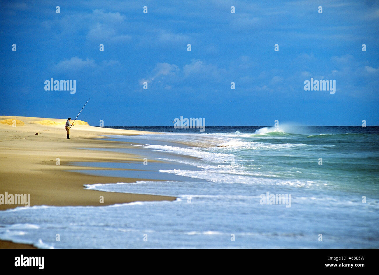 Surf fishing at Nauset beach Orleans Cape Cod National seashore MA Stock Photo