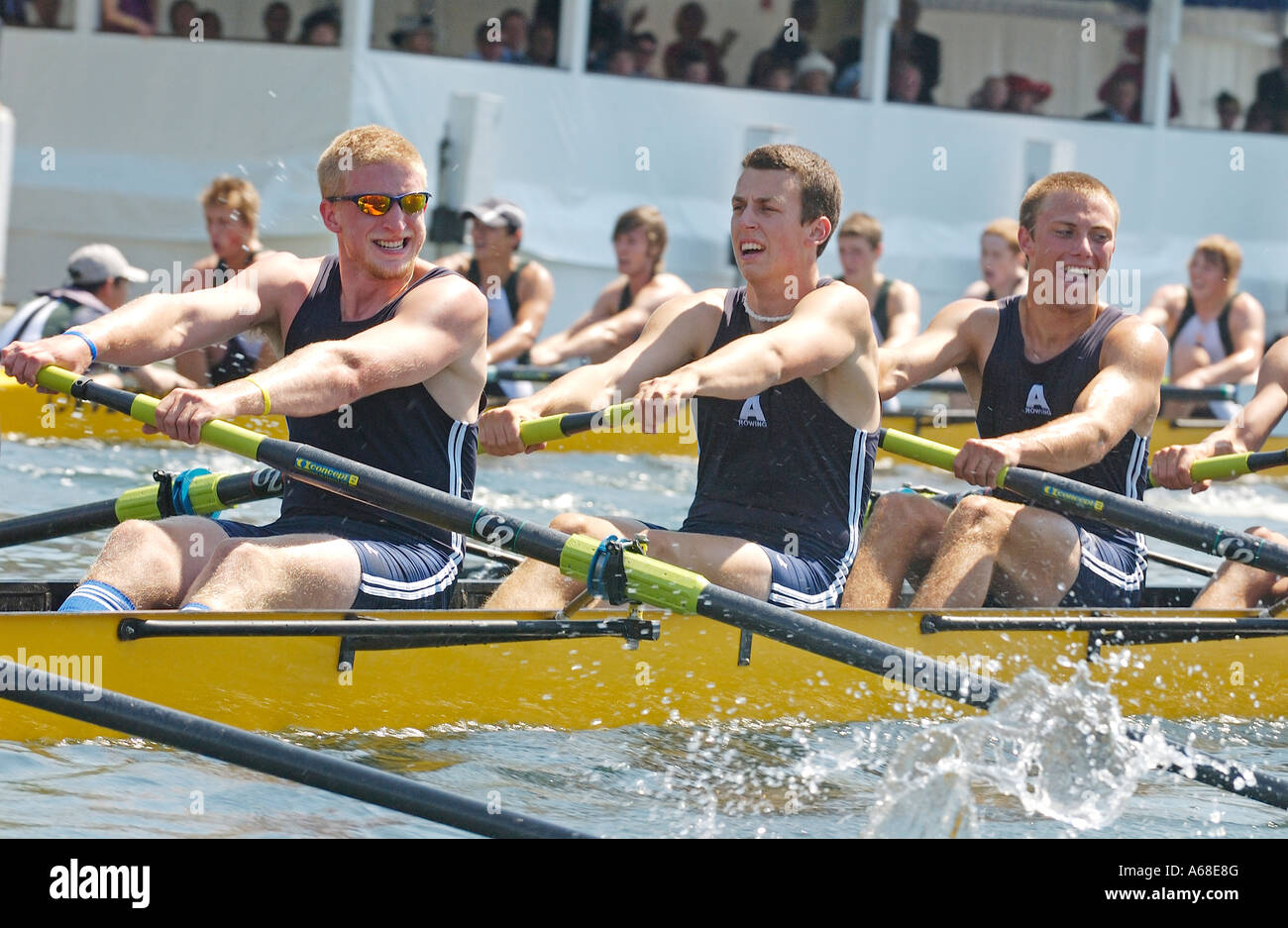 Collegiate eights racing to the finishing post in front of the ...