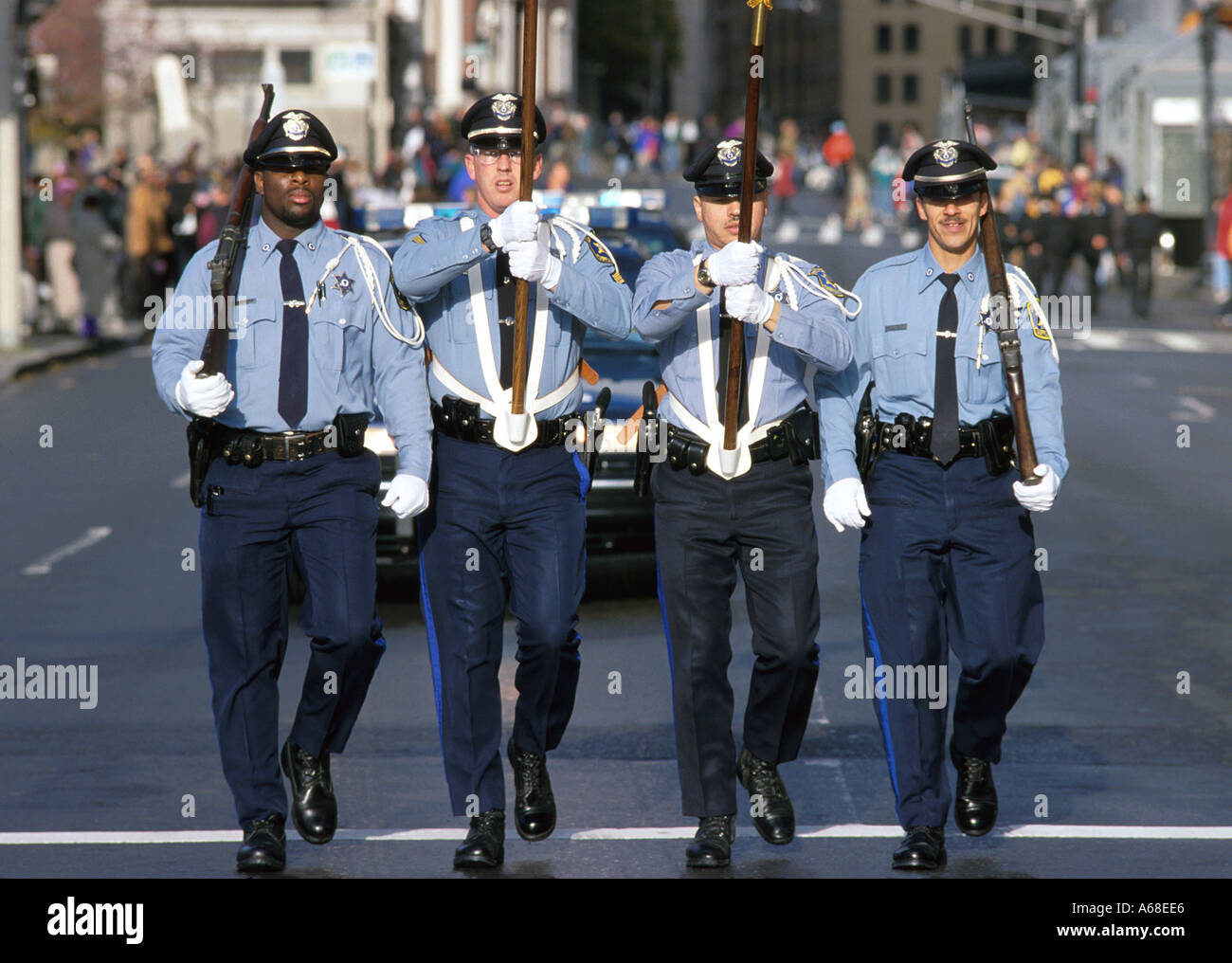 Police color guard marches in Veterans Day parade Boston Stock Photo