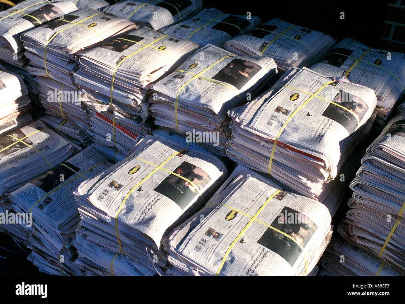 Bundles of newspapers at a news stand Stock Photo Alamy