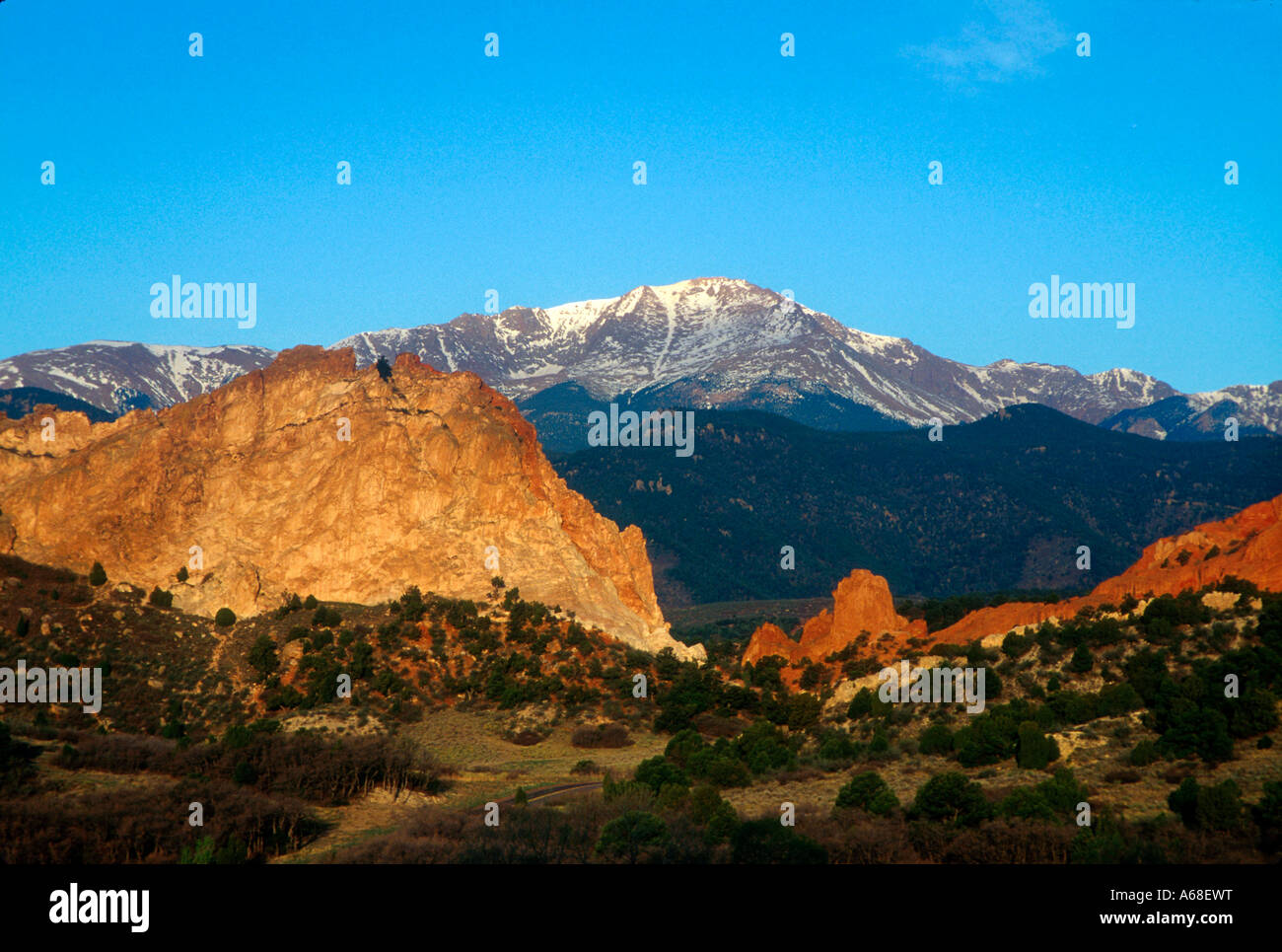 Sedimentary rock formation in the Garden of the Gods Park Colorado with Pikes Peak in distance, Colorado Stock Photo