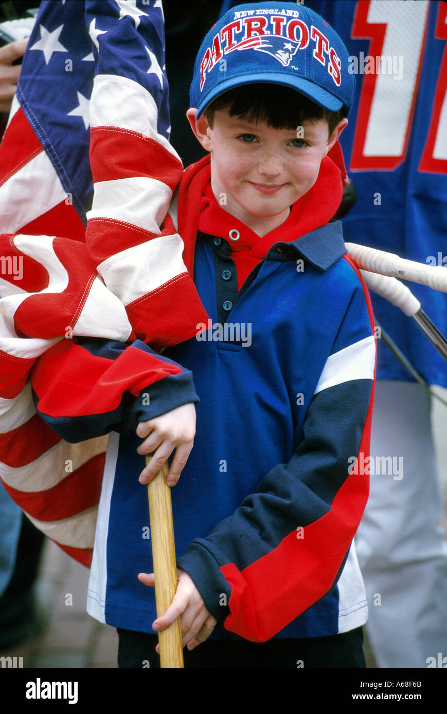 A boy holds an American flag Stock Photo