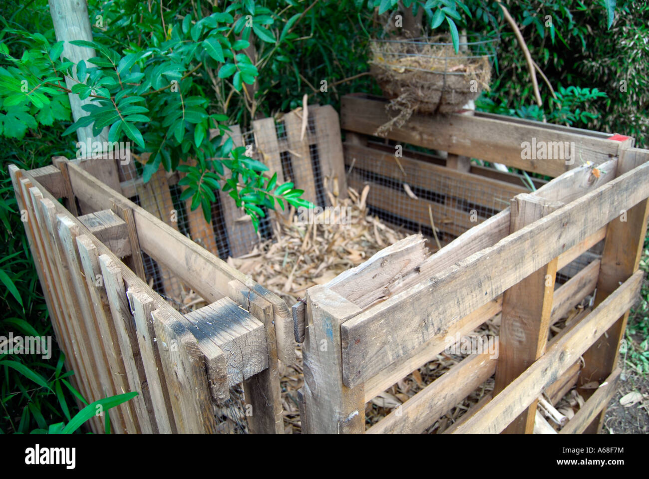 Compost bin made of recycled pine pallets Stock Photo Alamy