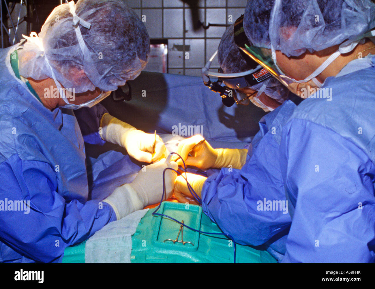 Surgeons performing a surgical procedure Stock Photo Alamy