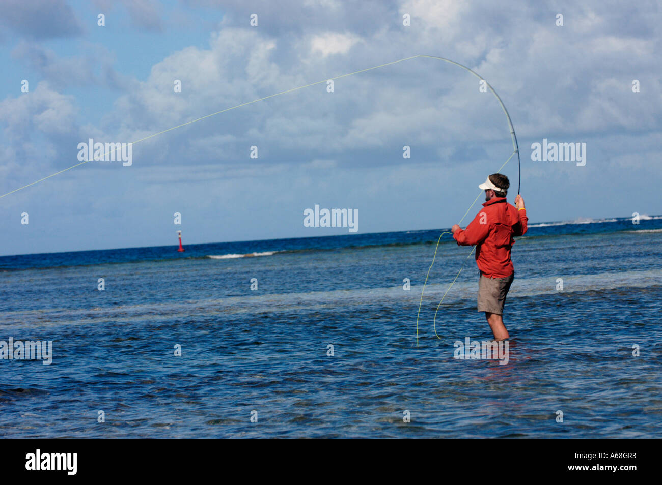 British Virgin Islands Caribbean Man casting while salt water fly