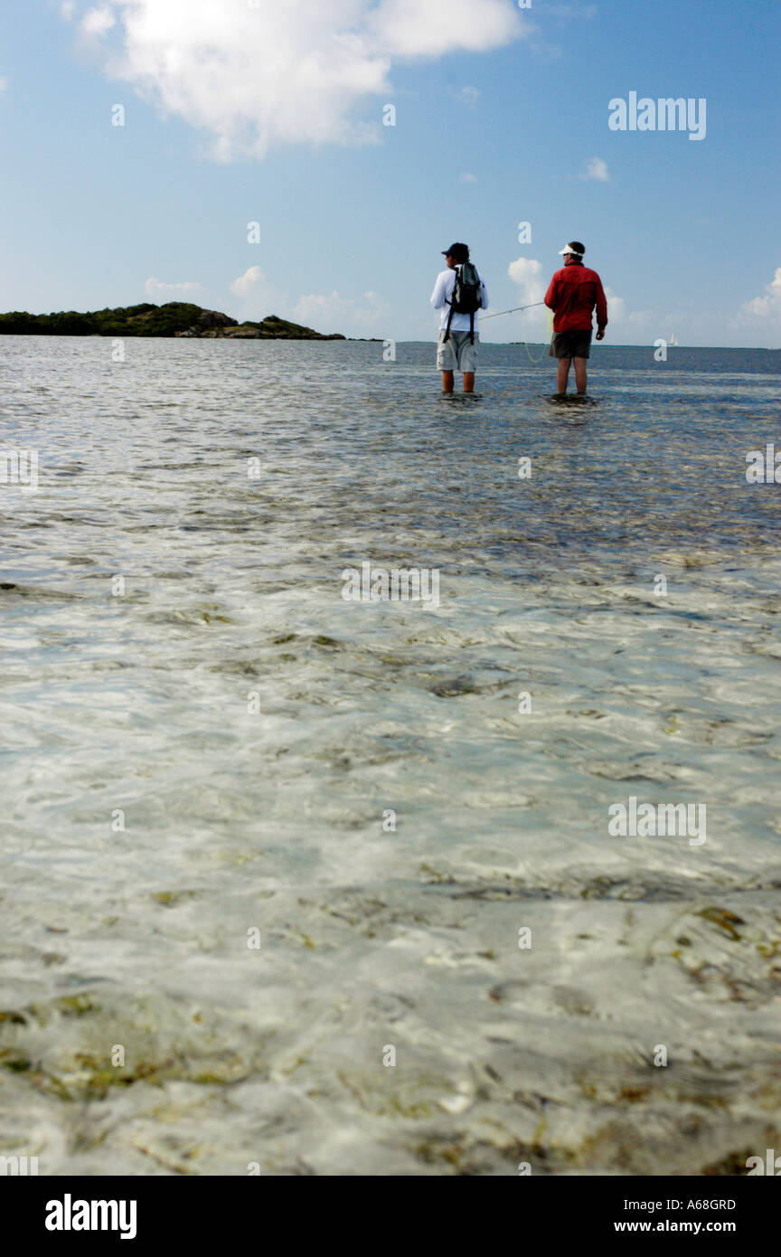 British Virgin Islands Caribbean Two men salt water fly fishing for