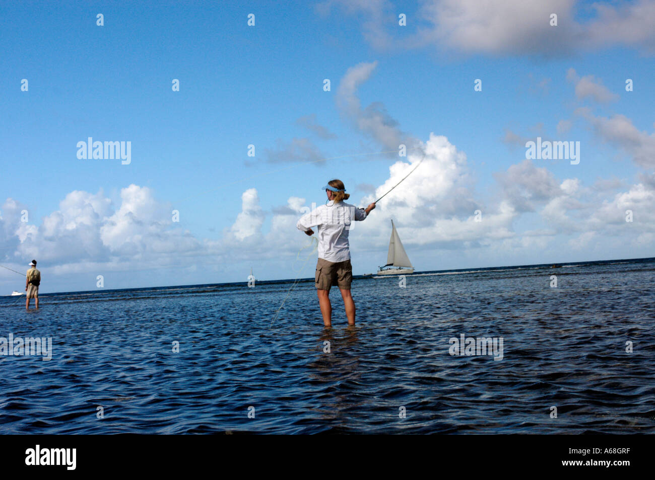 British Virgin Islands Caribbean Woman casting while salt water fly