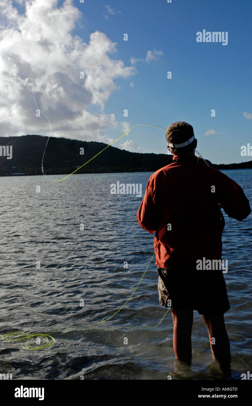 British Virgin Islands Caribbean View from behind a man casting while