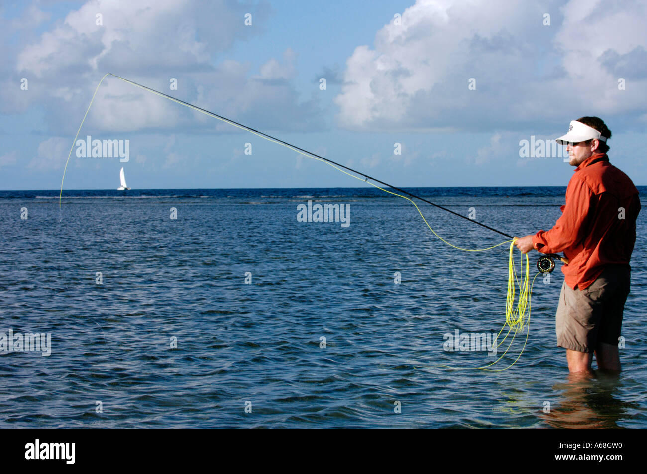 British Virgin Islands Caribbean Man stands on the flats while salt