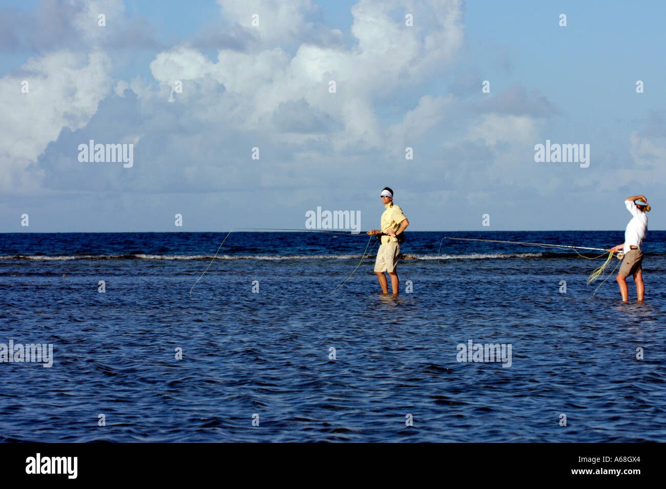 British Virgin Islands Caribbean Couple salt water fly fishing for bone