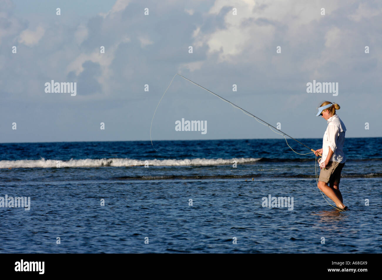 British Virgin Islands Caribbean woman salt water fly fishing for bone