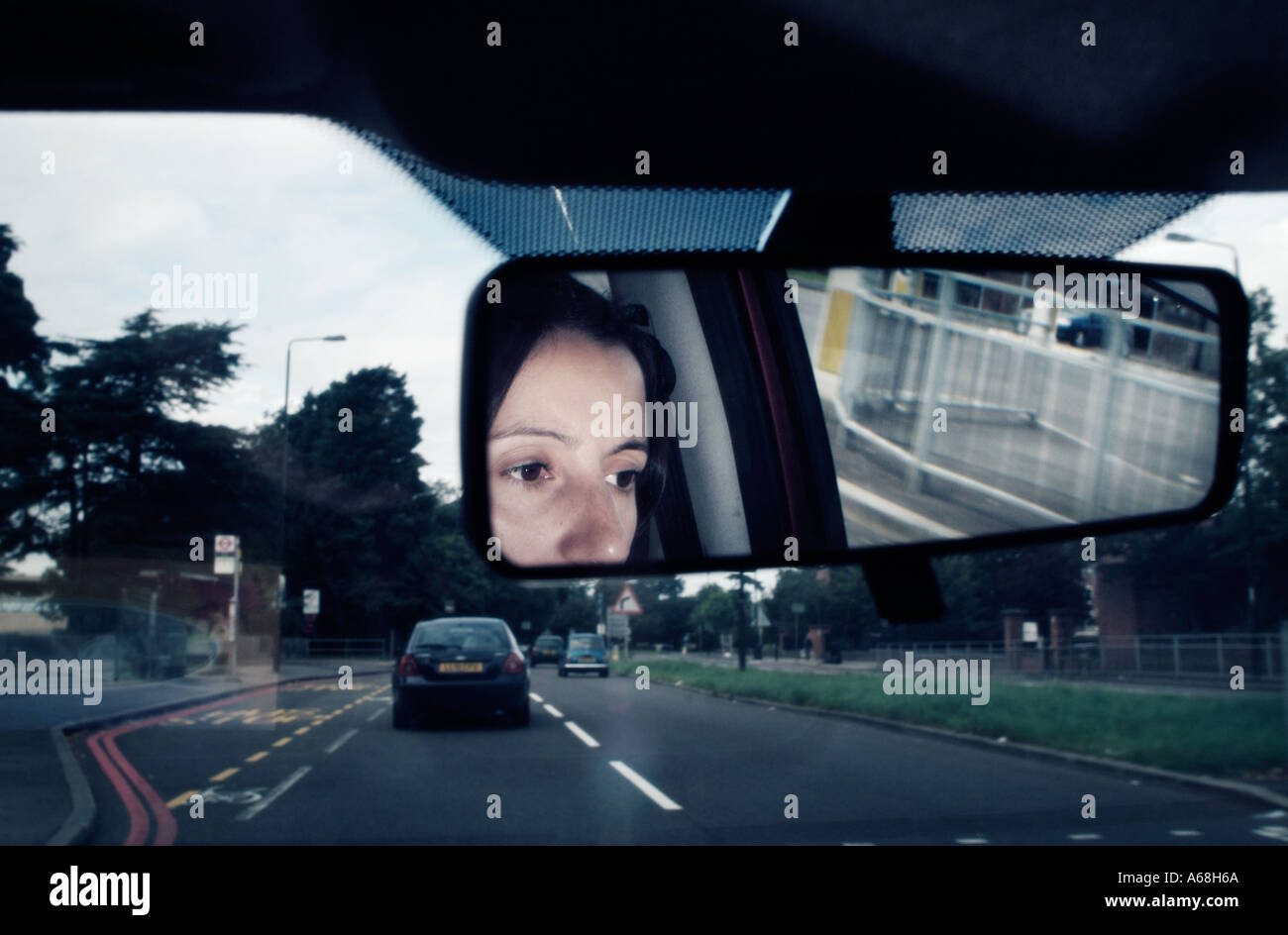 Rear view mirror eyes woman hi-res stock photography and images - Alamy