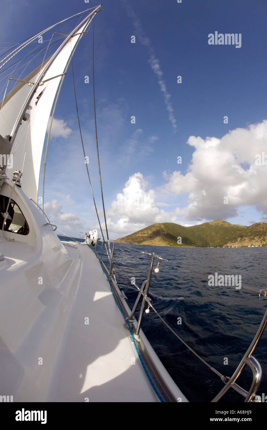 British Virgin Islands Caribbean Catamaran sailing in the blue sea with view through a fish eye lens Stock Photo
