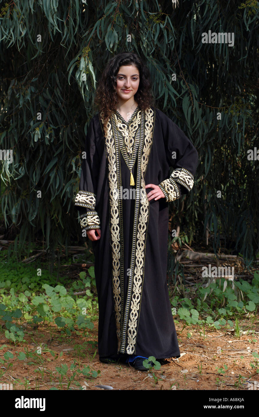 Arab woman wearing a traditional dress called abaya Stock Photo