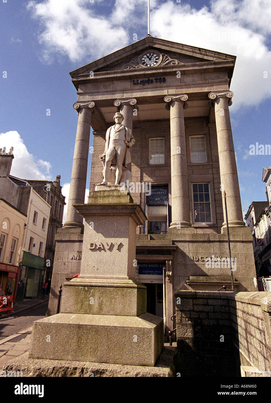 Sir Humphrey Davy statue and the Market House in Penzance in Cornwall Britain UK Stock Photo