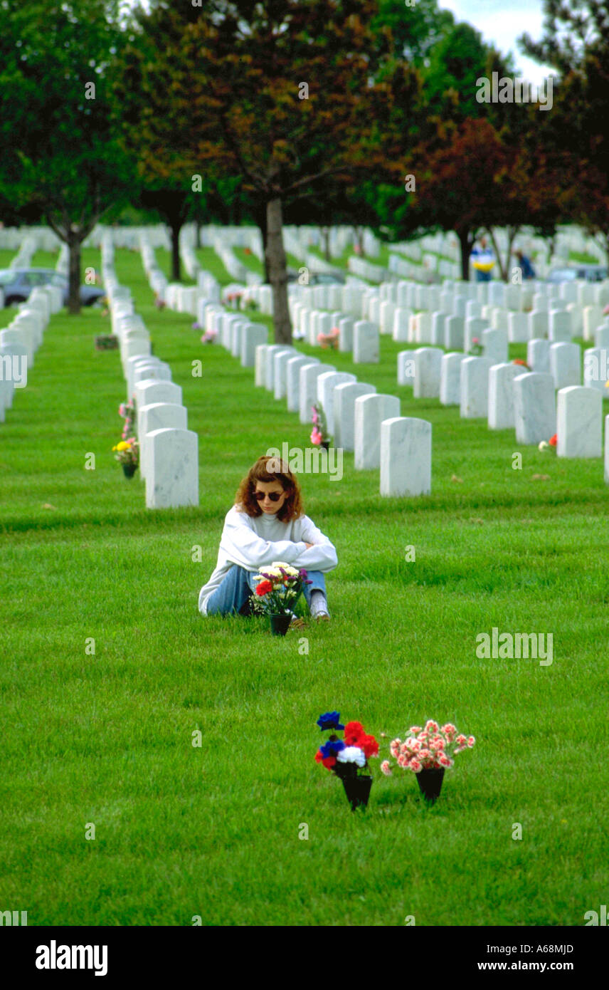 Woman age 25 remembering fallen soldier on Memorial Day. Minneapolis