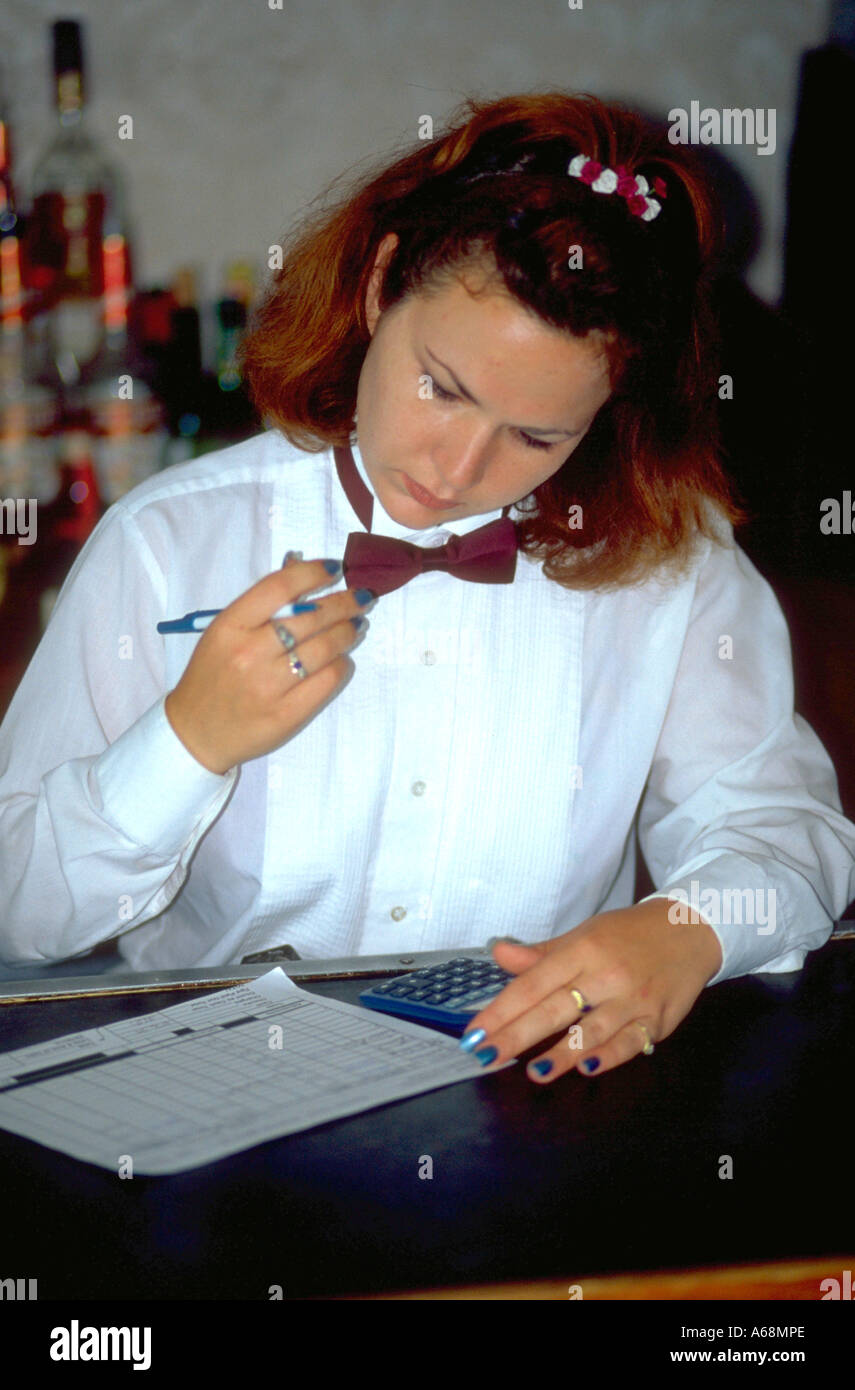 Waitress age 23 on tour boat decked out in formal attire. Tampa Florida