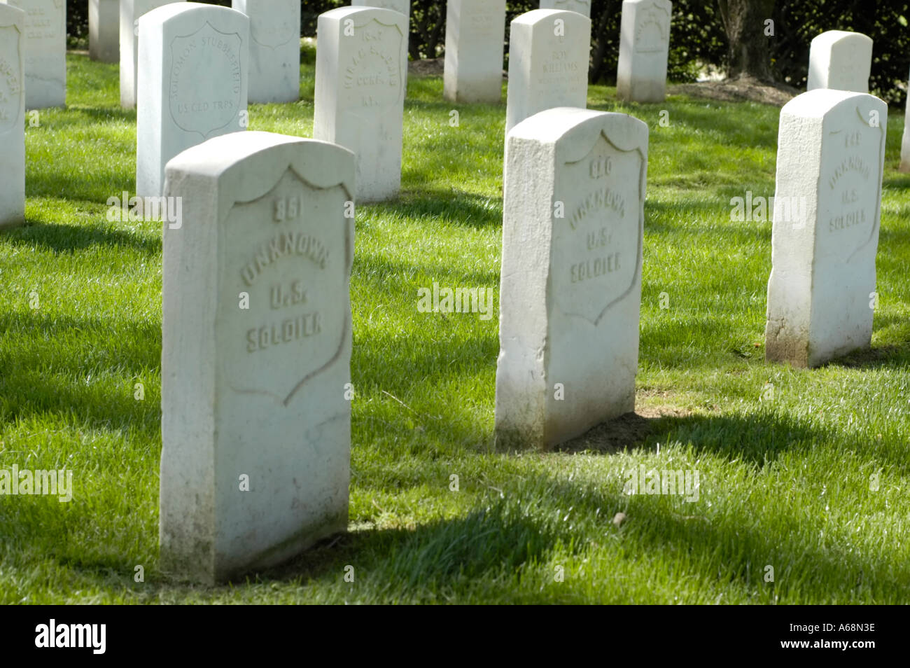 White marble tombstones on the graves of unknown American soldiers ...