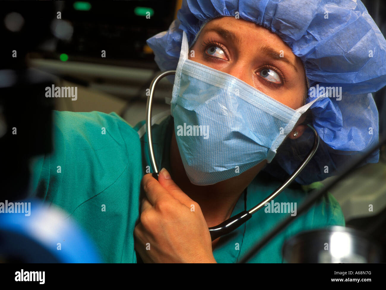 Anesthesiologist monitors a surgical patient Stock Photo
