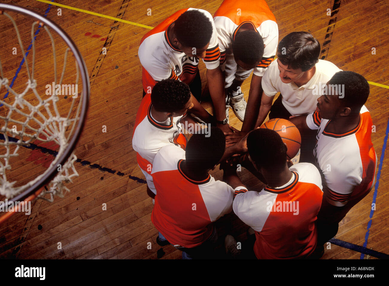 Team pep talk from coach Stock Photo