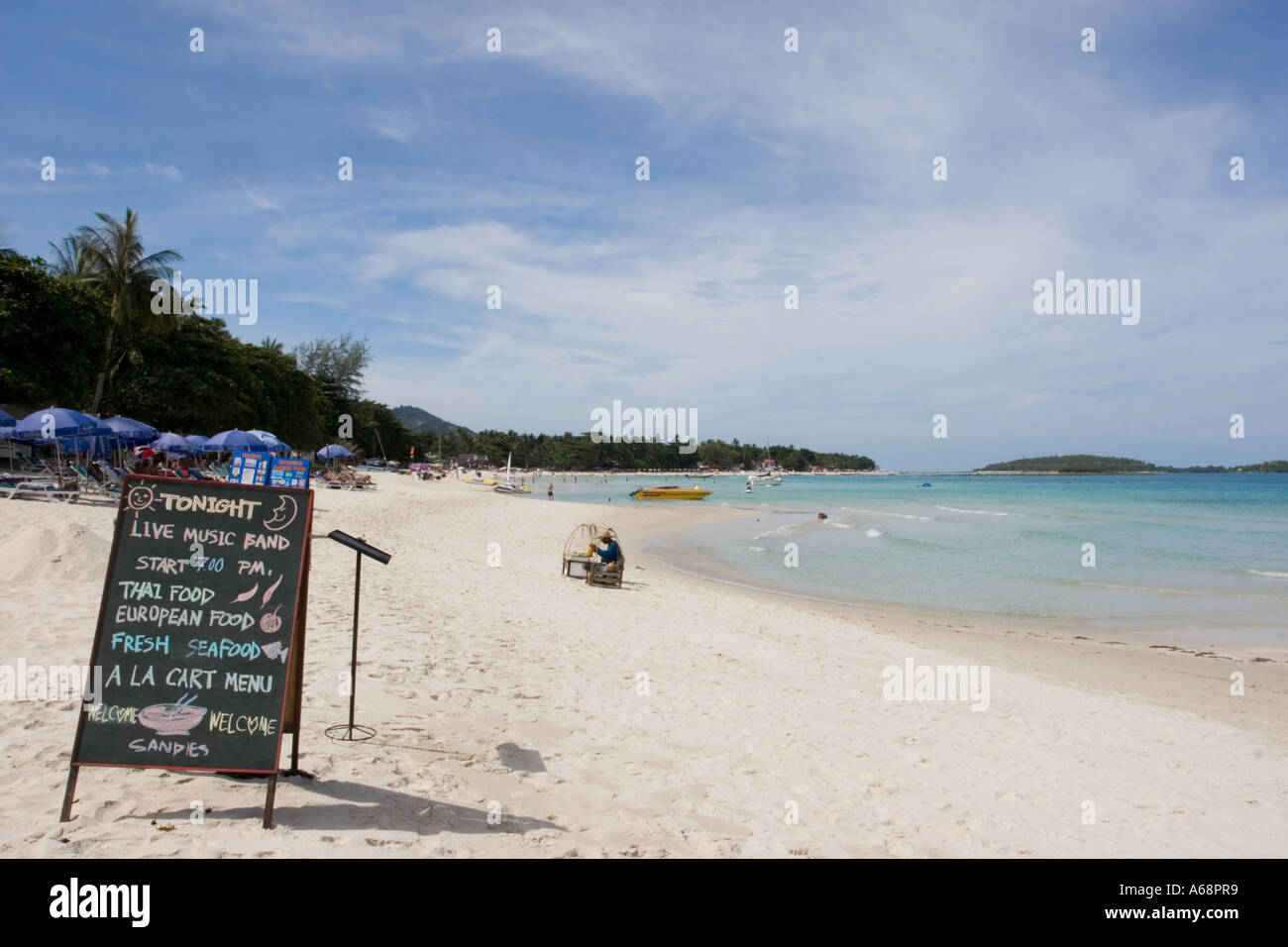 Chalkboard menu on a broad swathe of Chaweng Beach Stock Photo