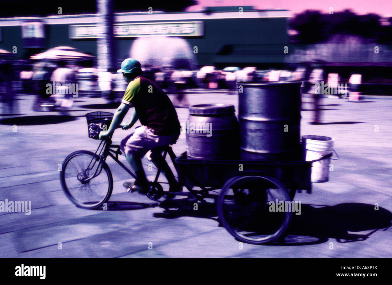 Cycle rickshaw puller in Tiananmen Square. Beijing. China. Stock Photo