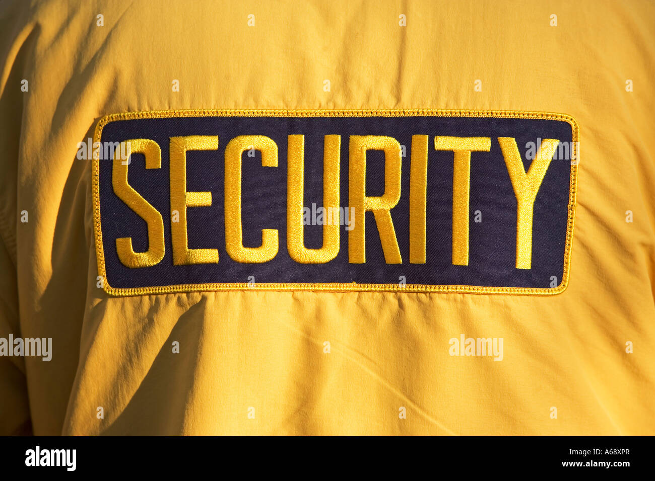 SECURITY SIGN ON JACKET Stock Photo
