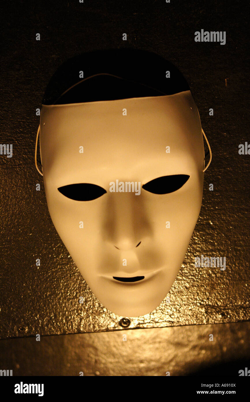 Color Photograph of Plastic Mask Against a Gold Toned Background Stock ...