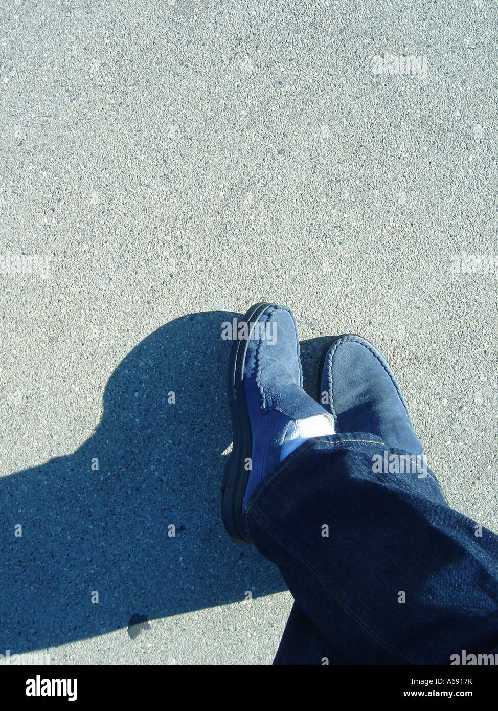 kontrol pludselig Zealot Man s Feet Wearing Blue Suede Shoes and Blue Jeans Viewed From Above  Contains Copy Space Stock Photo - Alamy