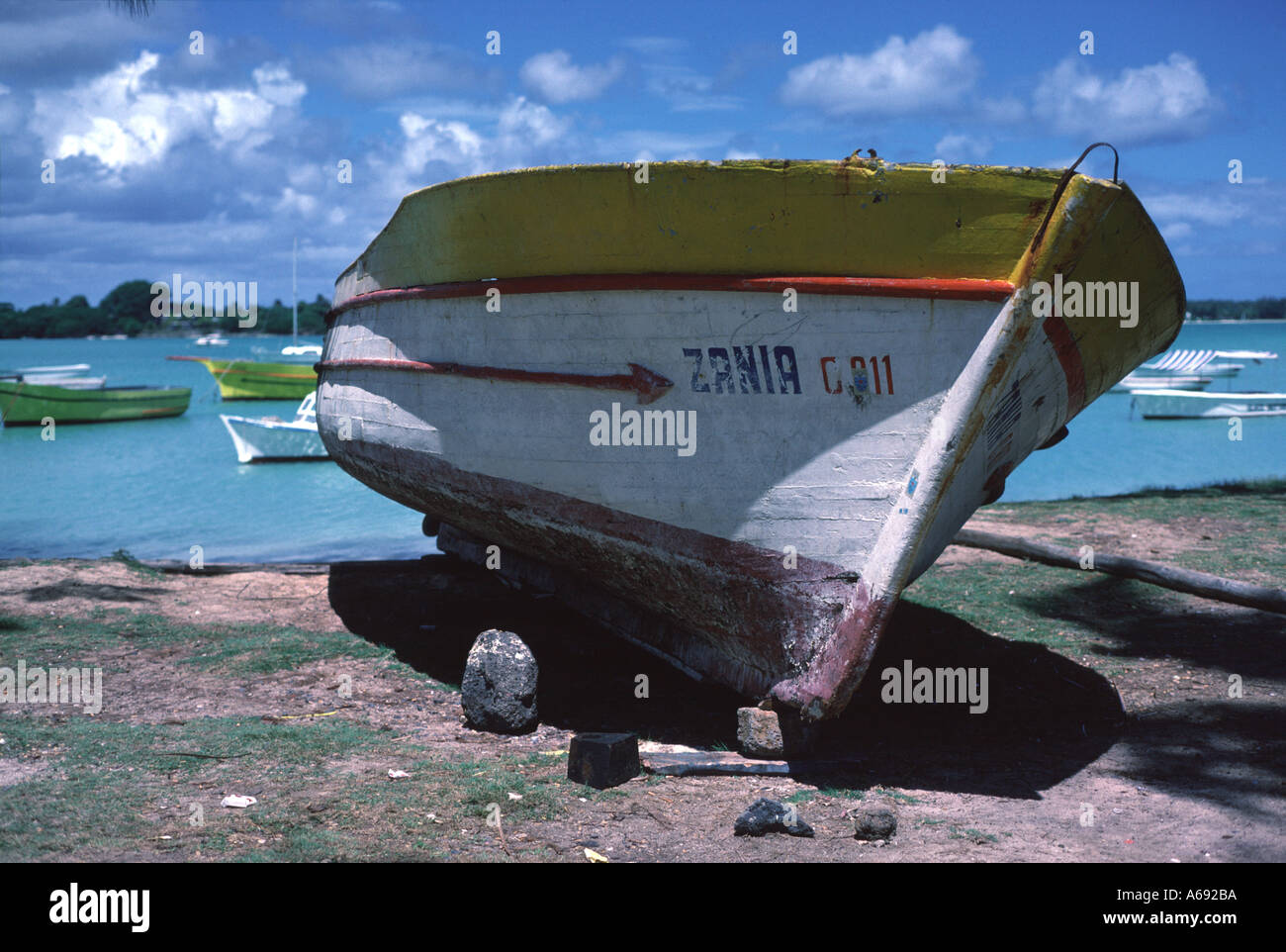 Fishing Boat on a Mauritius Beach Stock Photo - Alamy