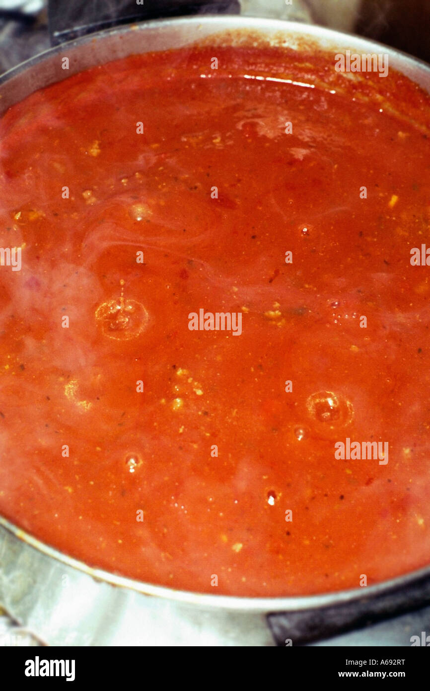 Pot of Tomato Sauce Boiling on Stove Top Copy Space Stock Photo Alamy