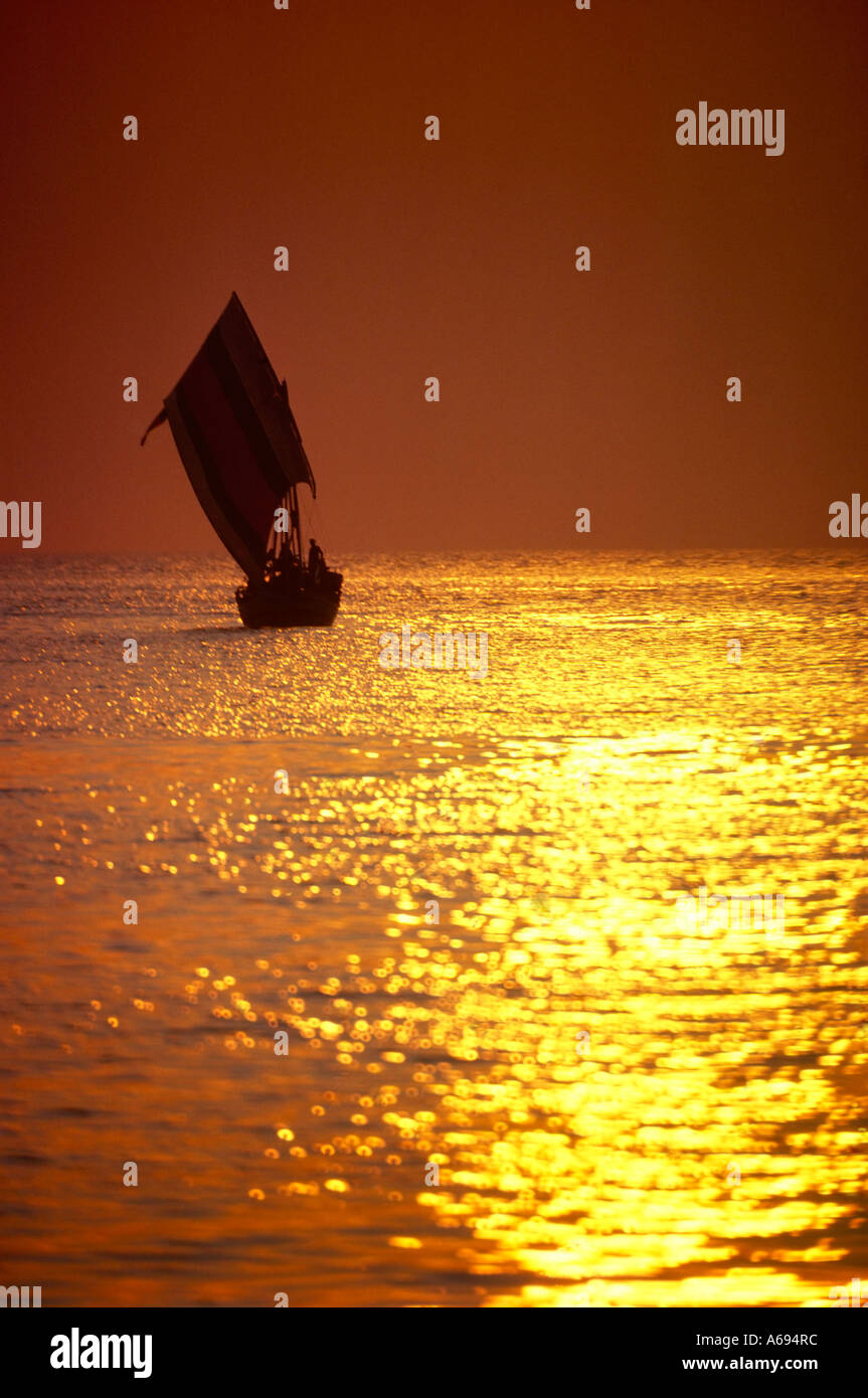Fishing boat in sunset sea hi-res stock photography and images - Alamy