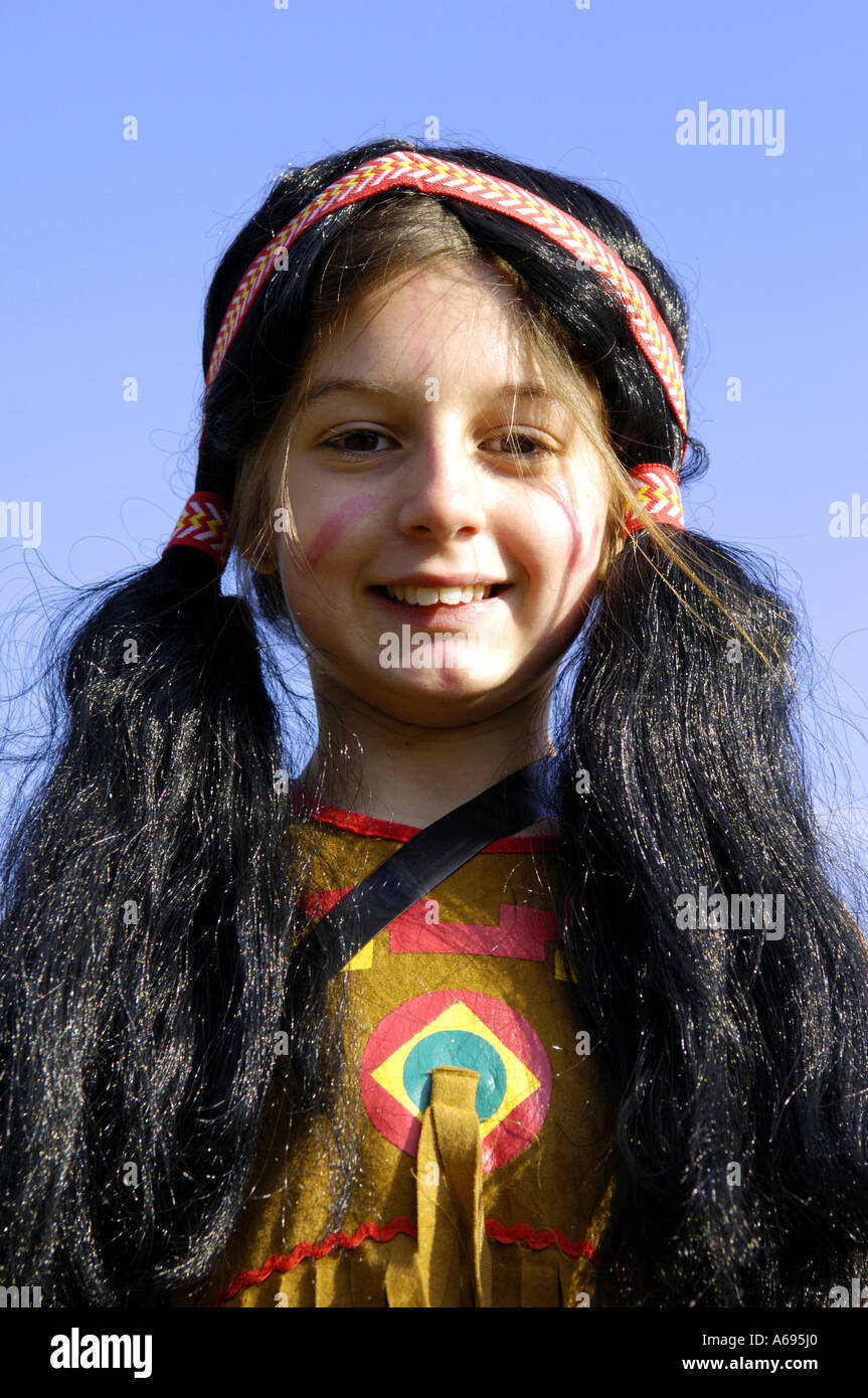 squaw native american idigenous female girl feather karneval carnival fancy dress costume positive dresing up fun enjoyment role Stock Photo