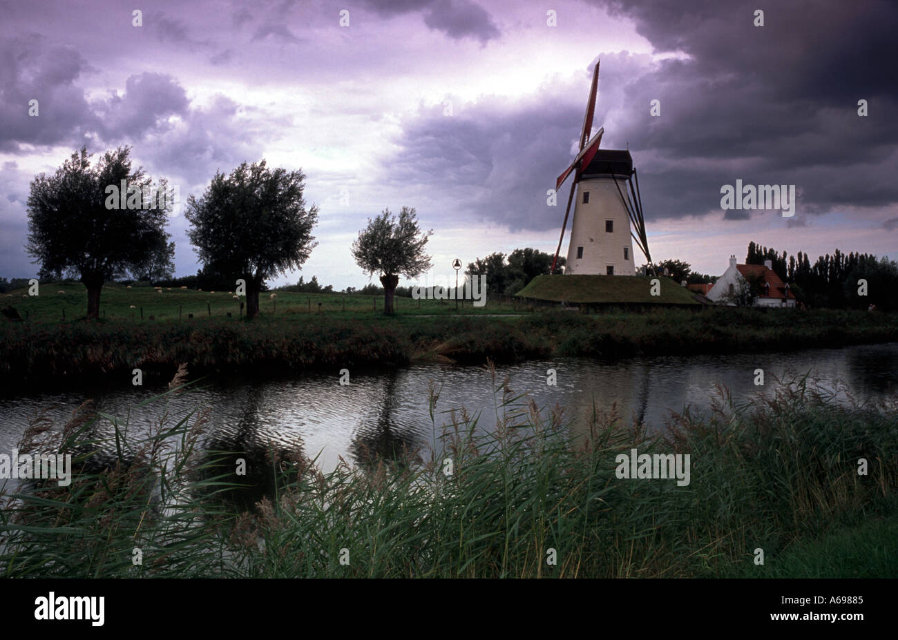 Wind mill at the channel Damme Brugge Flanders Belgium Stock Photo