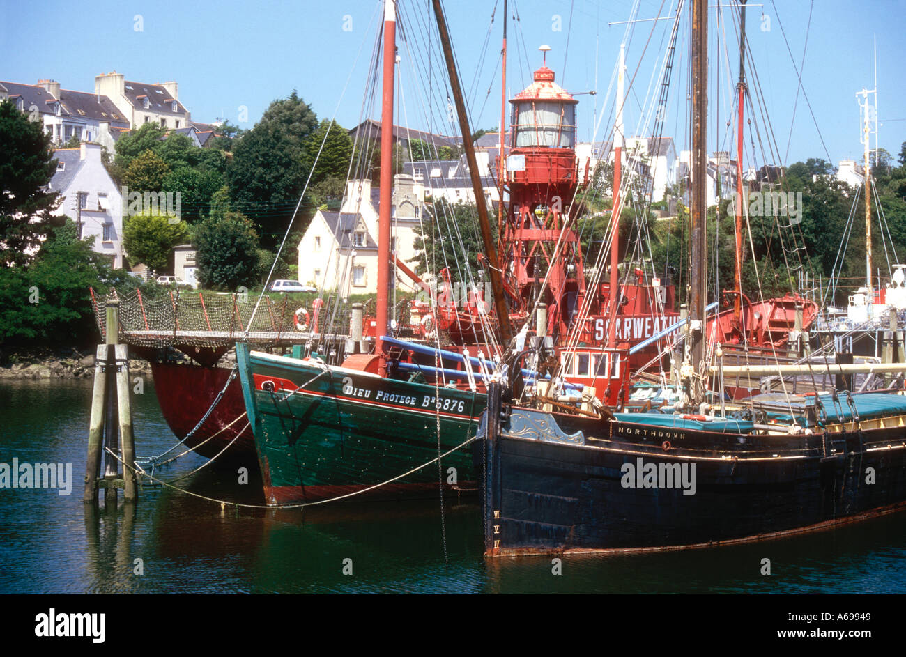 An historic barge fishing boat and lightship at Dournenez maritime museum in Finistère Bretagne France Stock Photo