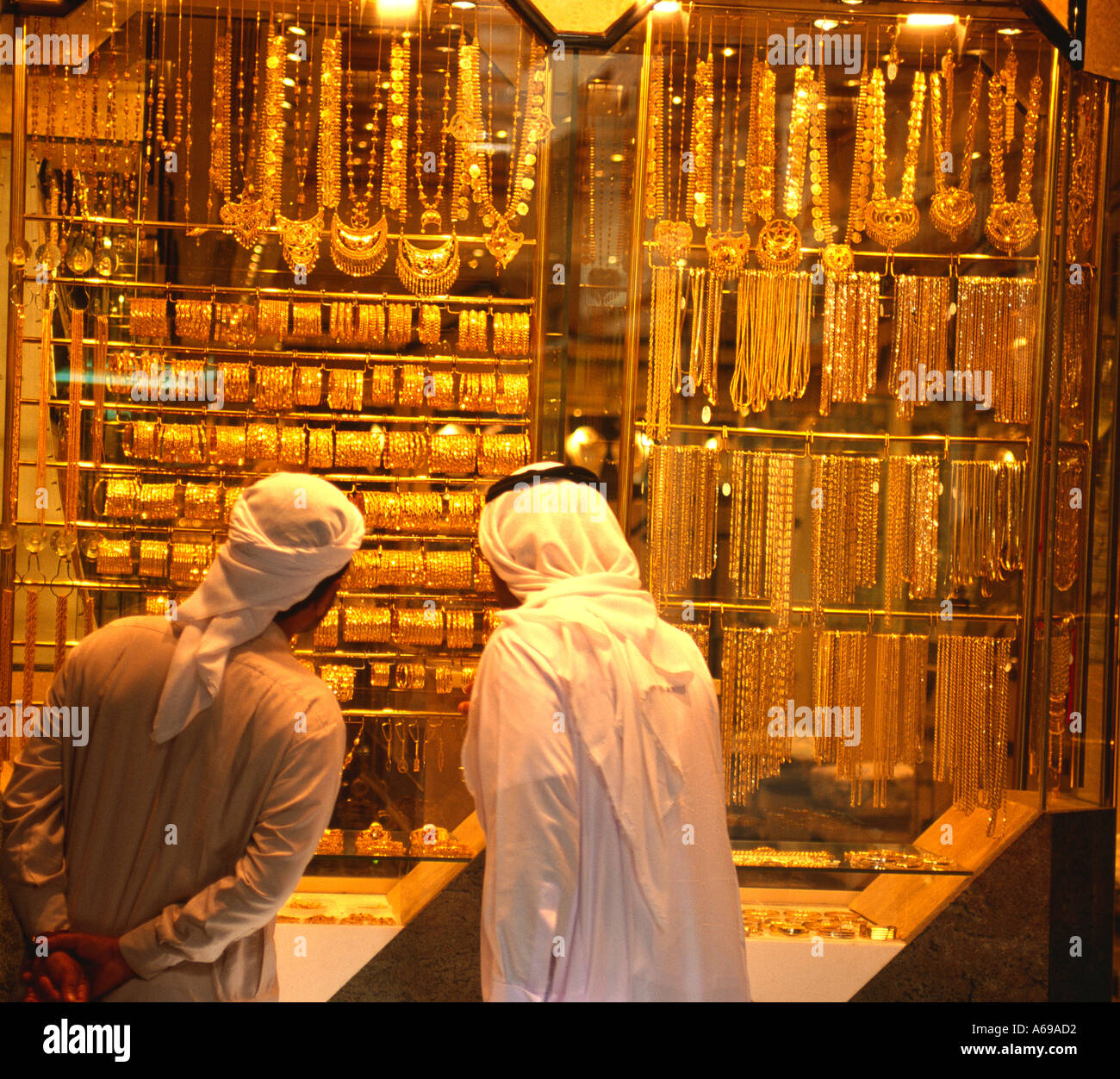 Arabs window shopping at a Jewellers window display Gold Souk Dubai ...