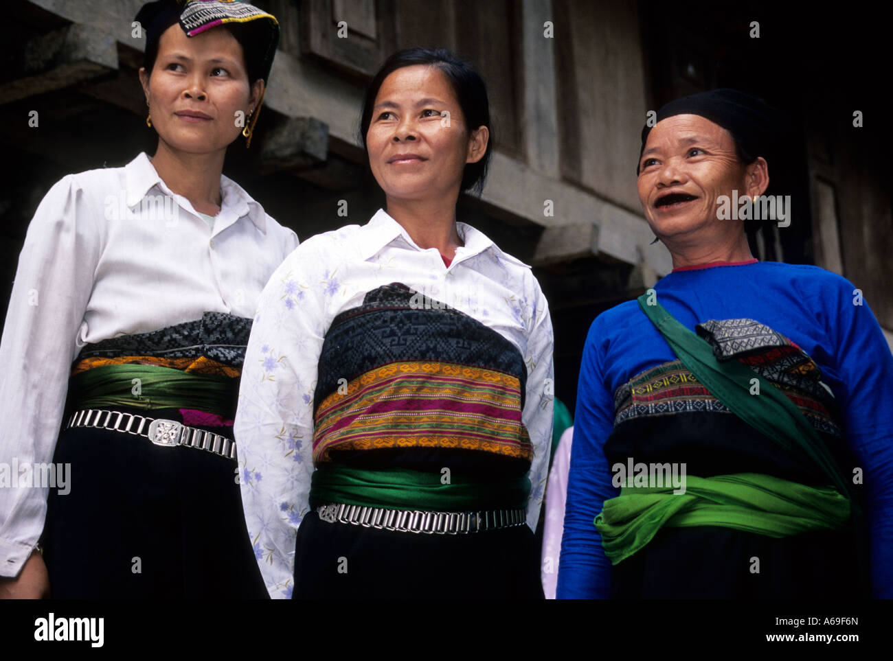 Three posing ladies of the Muong tribe, Vietnam Stock Photo